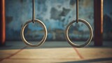 Fototapeta Krajobraz - Closeup old gymnastic rings on the blurred gym background