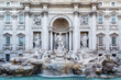 Amazing close-up view of the famous Rome Trevi Fountain (Fontana di Trevi) in morning light, Rome, Italy.