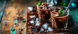 Selectively focused creamy sweet chocolate liqueur with ice.