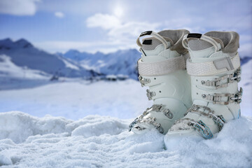 Wall Mural - White shoes on snow and frost with empty space for your decoration. 