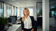 © Restyler - Beautiful blonde woman in stylish business clothes. Successful strong woman, office worker, manager.