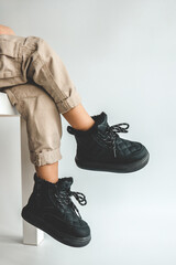 Wall Mural - Stylish fashionable black children's shoes, close-up