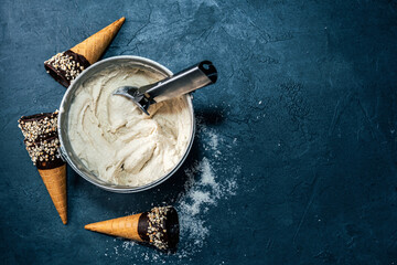 Wall Mural - Creamy vegan coconut ice cream in a big metal bucket overhead