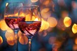 Two wine glasses touching at their tips against a blurred romantic background, a symbolic Valentine's moment with copy-space for celebratory messages.