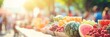 Blurred bokeh effect at vibrant farmers market with fresh fruits and colorful beverages