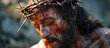 Jesus Christ with thorns on his head during crucifixion.
