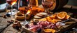 Assorted snacks and wine in orange or rose hues.