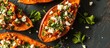 © 2rogan - Closeup overhead view of baked sweet potatoes stuffed with feta and parsley.