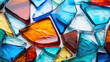 Close-up of multicolored broken glass pieces, creating a vibrant texture with sharp edges and reflective surfaces.