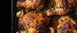 French food: Baked chicken with lots of garlic, close-up from above.