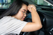 © virojt - Young woman Asian are feeling sleepy while driving