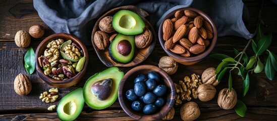 Nourishing foods rich in good fats: nuts, almonds, walnuts, hazelnuts, cashews, olives, avocado. Beneficial for weight loss.