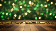 A Collection Of Scattered Gold Coins Lying On A Wooden Surface With A Green Bokeh Light Background, Evoking Wealth And Luck.
