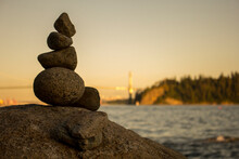 A View Of Stone Stacking Next To Burrard Inlet, Vancouver, British Columbia.