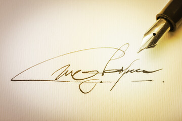 Wall Mural - Sheet of paper with fountain pen and signature, closeup