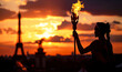 Athletic Woman Is Holding Olympic Torch With Fire Near Paris Tower, Silhouette Against Dawn Sky, Panorama Wide Banner With Copyspace