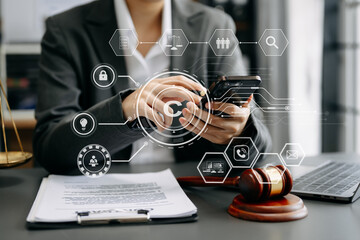 Wall Mural - Copyright or patent concept, Person hand using laptop computer, tablet and smartphone with virtual screen copyright icon trademark, Creation ownership against piracy