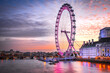 The London Eye on the South Bank of the River Thames at night, United Kingdom capital city, London.