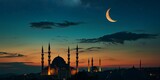 Fototapeta  - Muslim mosque silhouette and the moon in the night sky. Ramadan festive, islam religion