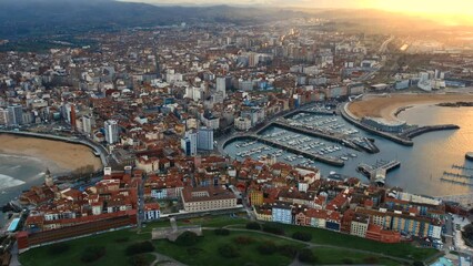 Poster - Drone point of view Gijon or Xixon city in north-western Spain during sunset, coast of Cantabrian Se, Bay of Biscay, in the central-northern part of Asturias. Travel destinations, landmarks concept