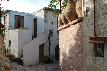 Wall Mural - alley and old houses in a village (margarites) in crete in greece 