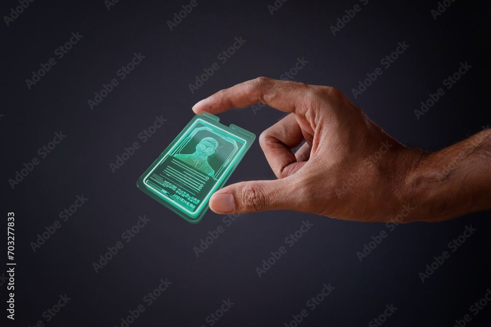 Closeup image of hand and digital identification card or digital ID on ...