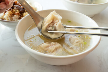 Wall Mural - Wonton dumpling soup, distinctive and famous cuisine of Taiwanese food.