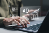 Fototapeta  - Digital marketing commerce online sale concept, Businessman use laptop with advertising on website. planning advertising marketing strategies to target social media native, ad, advertisers, sales.