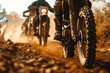 Close-up of motocross bike tires on a muddy track