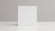 white square book mockup front view with blank hard cover standing on white table 3d rendering