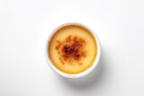 Top view of creme brulee traditional French vanilla cream dessert isolated on the white background
