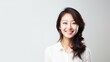 © romanets_v - Radiant Smile: Portrait of a Joyful Asian Woman in Her 30s