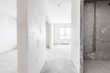  interior of the apartment without decoration in gray colors. rough finish