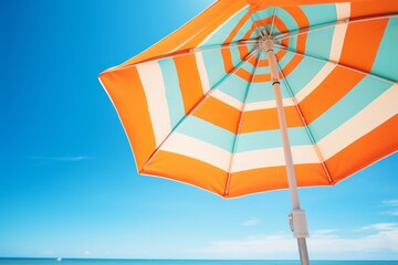 Beach umbrella against a blue sky