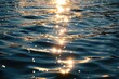 Shimmering Water Surface with Sun Reflections