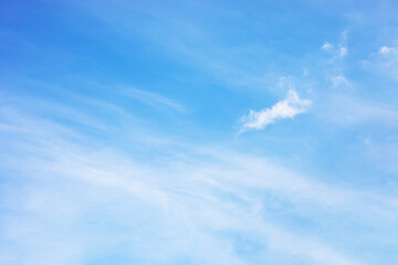 Wall Mural - fantastic soft white clouds against blue sky and copy space horizontal shape