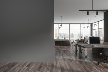 Grey office interior with desk and pc computers in row, window. Mock up wall