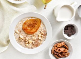 Wall Mural - Oat porridge with caramelized pear and peanut