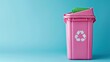 
An eco-friendly banner features a pink plastic recycle bin with copy space, isolated against a blue background, promoting awareness and encouraging responsible waste disposal.