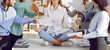Banner with cropped shot of calm woman sitting on office table in yoga pose, mediating, relaxing, and ignoring team of coworkers demanding to do paperwork, answer phone calls and do lots of other work