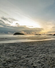 Sticker - beach sand reflecting the rising sun. sandy beach with watery textures.