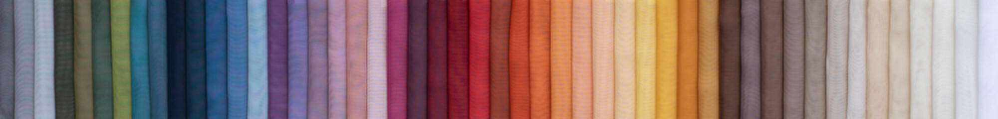 Canvas Print - Colorful upholstery fabric samples in store