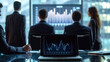© Kaiplapan - Group of business people having analysis meeting Marketing plan in a conference room with a board displaying stock graphs and a laptop on the table.