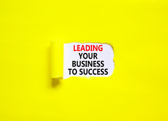 Wall Mural - Leading your business to success symbol. Concept words Leading your business to success on beautiful white paper. Beautiful yellow paper background. Leading your business to success concept Copy space