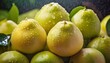 Close-up of many wet pomelos. Selective focus.