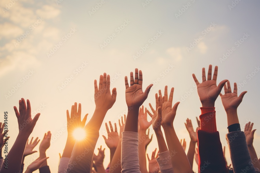 People of different ethnicities raising their hands in the air Stock ...