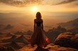  a woman in a long dress standing on top of a mountain looking out at a valley and the sun setting in the distance with mountains in the distance in the distance.