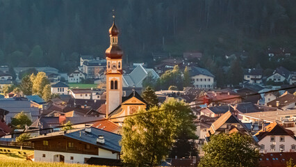 A church on a sunny summer day at Fulpmes, Stubaital valley, Innsbruck, Tyrol, Austria