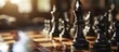 Shallow depth of field image of chess pieces on a board.