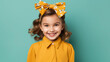 © Julia Zarubina - beautiful smiling little girl with headband and wavy hair on color background in studio, happy child, children's fashion, portrait, kid, childhood, stylish person, cute baby, hairband, emotional face